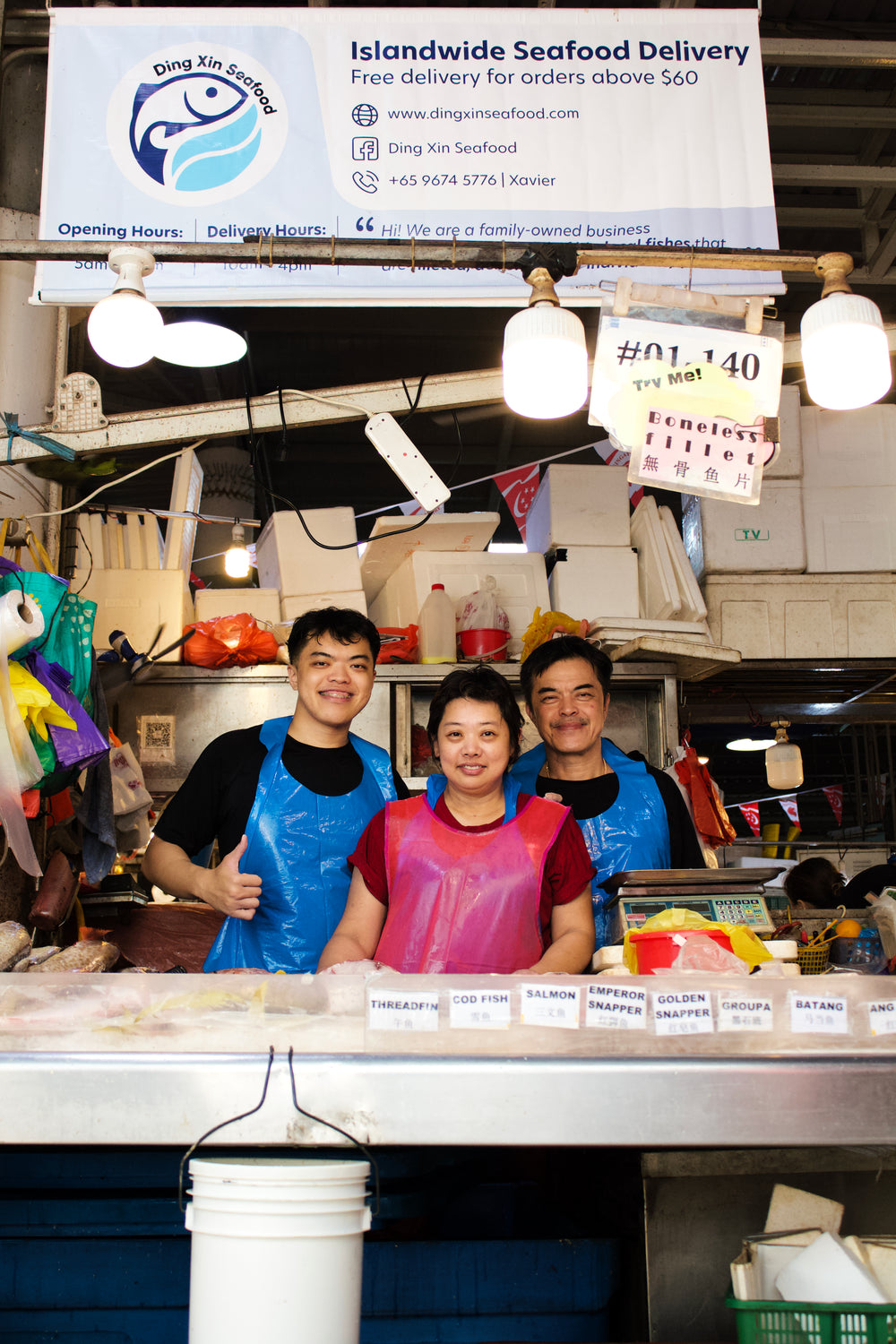 The Ding Xin family at their Jurong West market stall