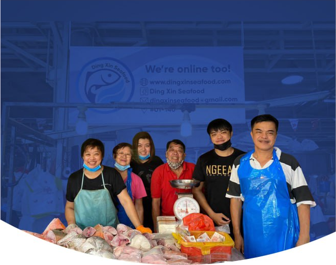 The Ding Xin family at their stall in Jurong West market